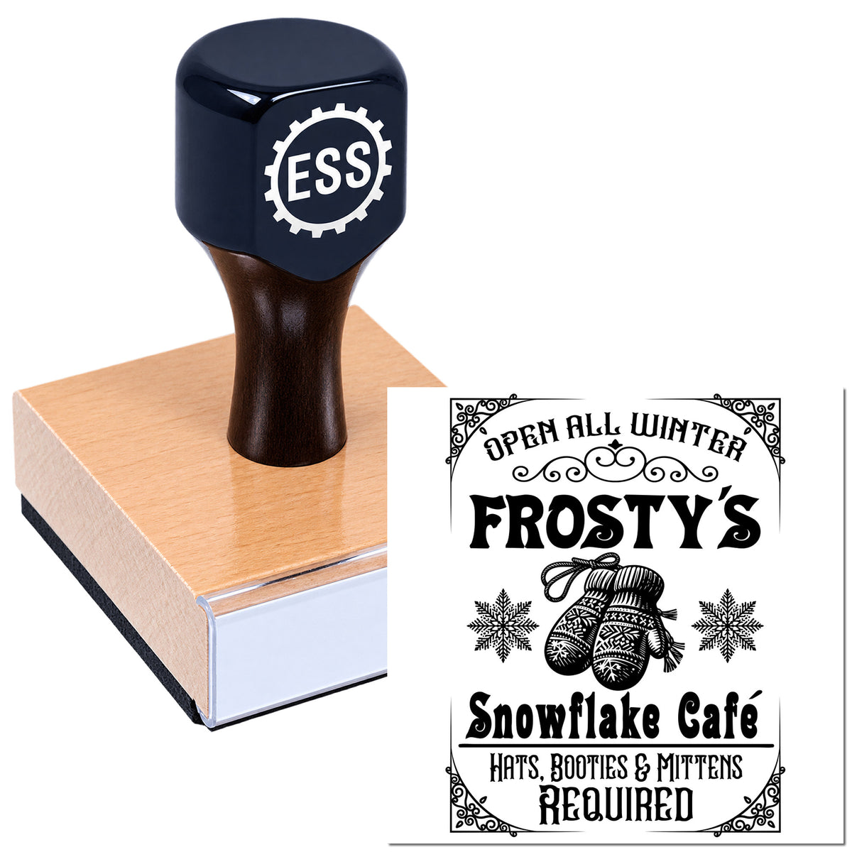 Navy rubber stamp on pink wood base with Frosty's Snowflake Cafe winter seal design, black text, mittens and snowflakes.