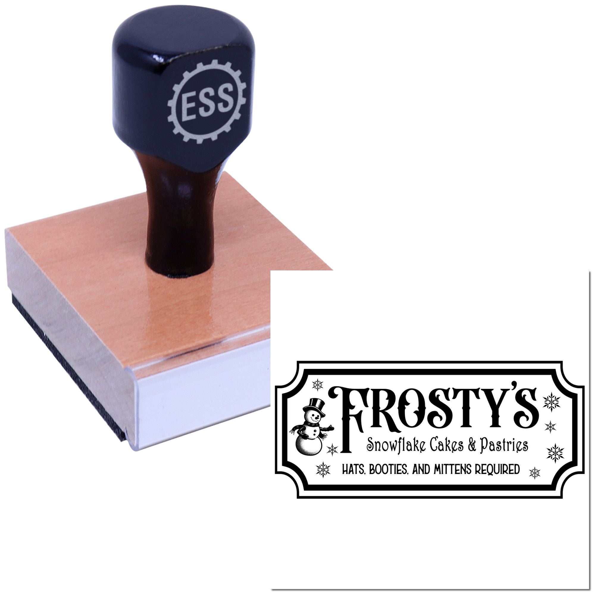 Dark blue ESS rubber stamp on a wooden block with a Frostys snowflake cakes and pastries seal sample.