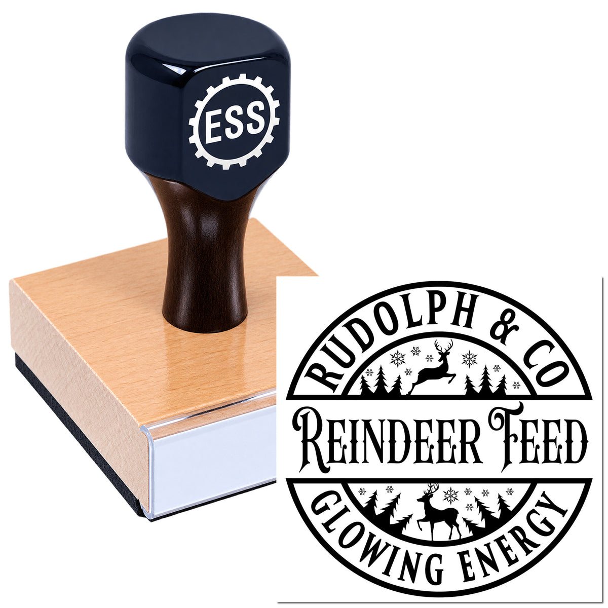 Black ESS rubber stamp on wooden block beside custom round seal for Rudolph & Co Reindeer Feed, with deer and trees.