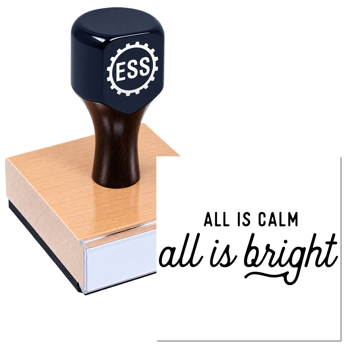 Black ESSI self-inking stamp on a pink seal block, with "All is calm, all is bright" imprint.