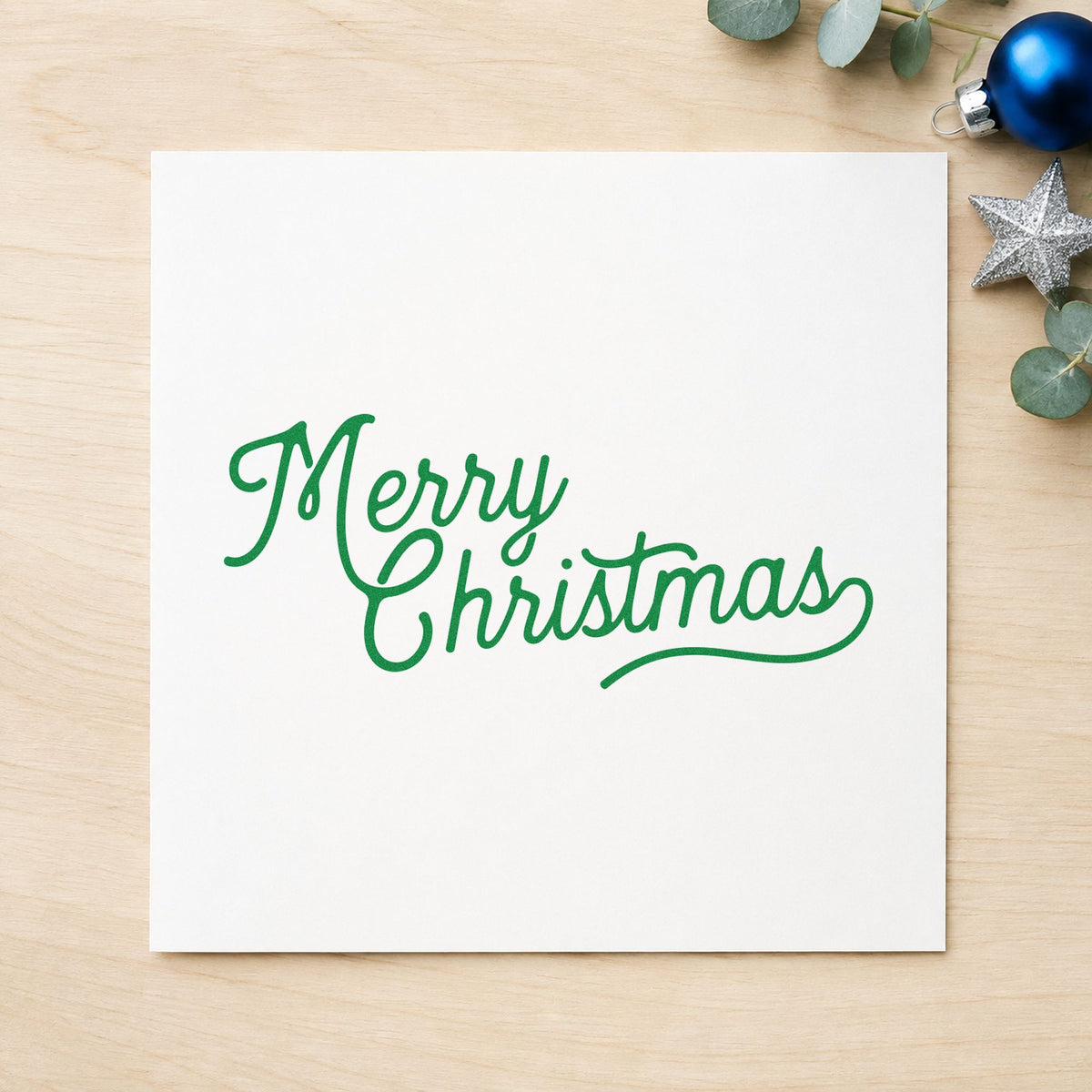 Merry Christmas Script Greeting craft stamp imprint in green ink on a handmade project, one idea being class handout cards.