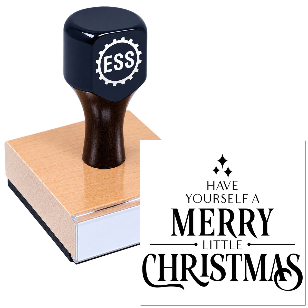 Black rubber stamp seal on a wooden block, showing a white Merry Little Christmas design with sparkles.