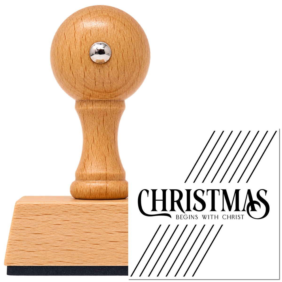Vintage Pro beech wood stamp with a round knob handle, shown with its black Christmas Begins With Christ Lettering imprint on white.