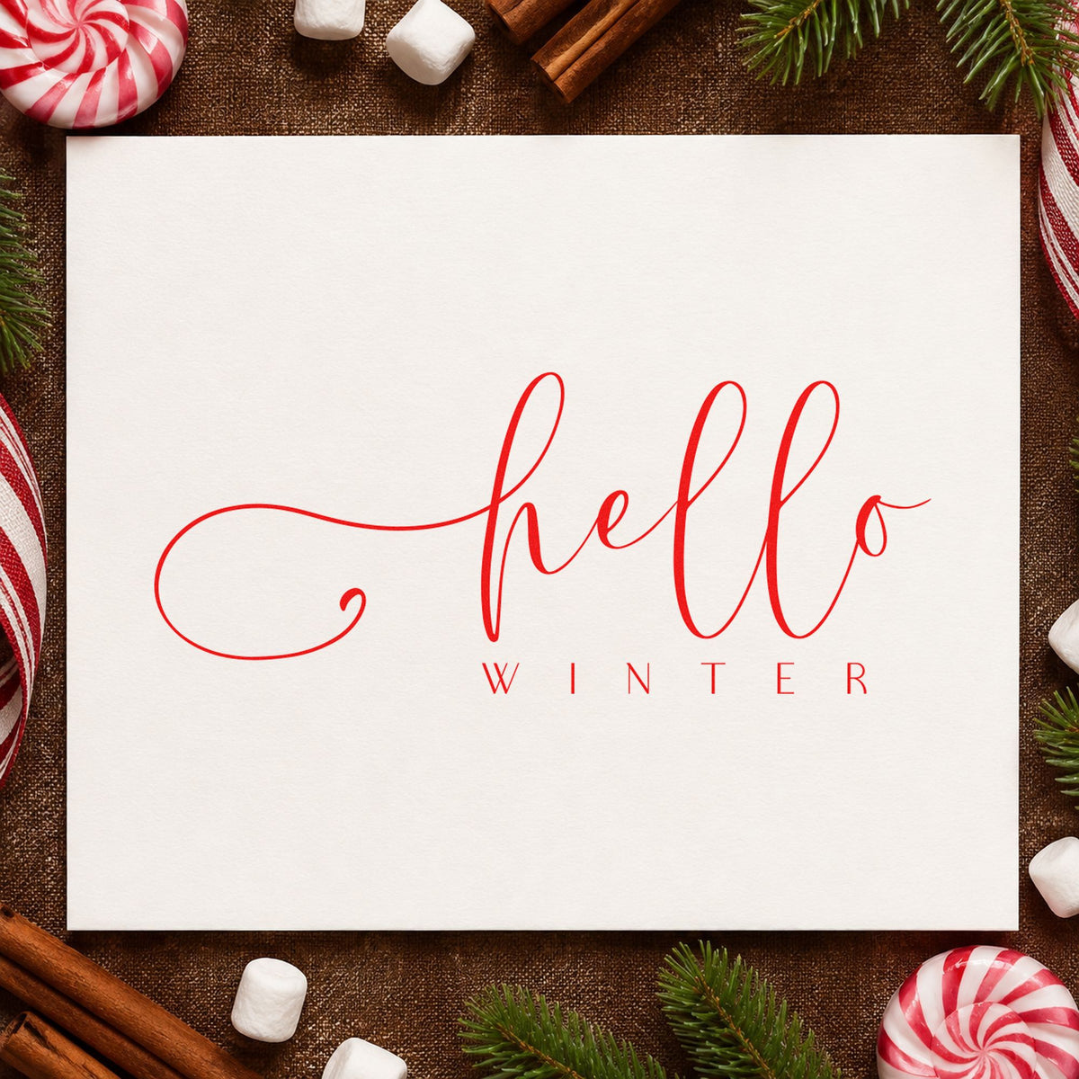 Hello Winter Fine Script rubber stamp shown in red ink, stamped for projects such as shelf plate labels.