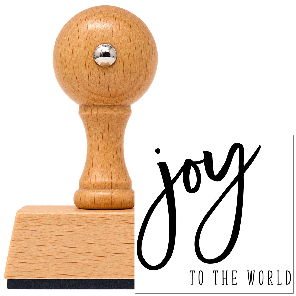 Vintage Pro beech wood stamp with a round knob handle, shown with its black Joy To The World Brush Script Lettering imprint on white.