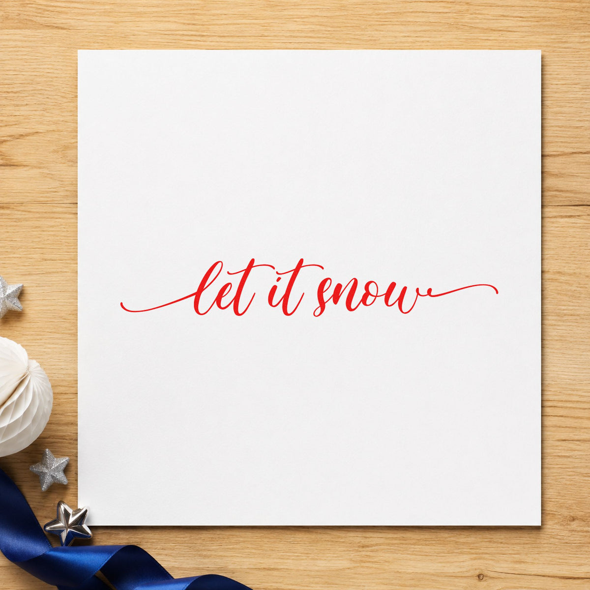 Let It Snow Flourished Line rubber stamp shown in red ink, stamped for projects such as box wrap labels.