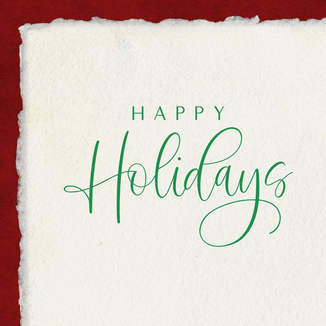 Green Happy Holidays stamp and seal on white textured paper with torn edges over a red background.