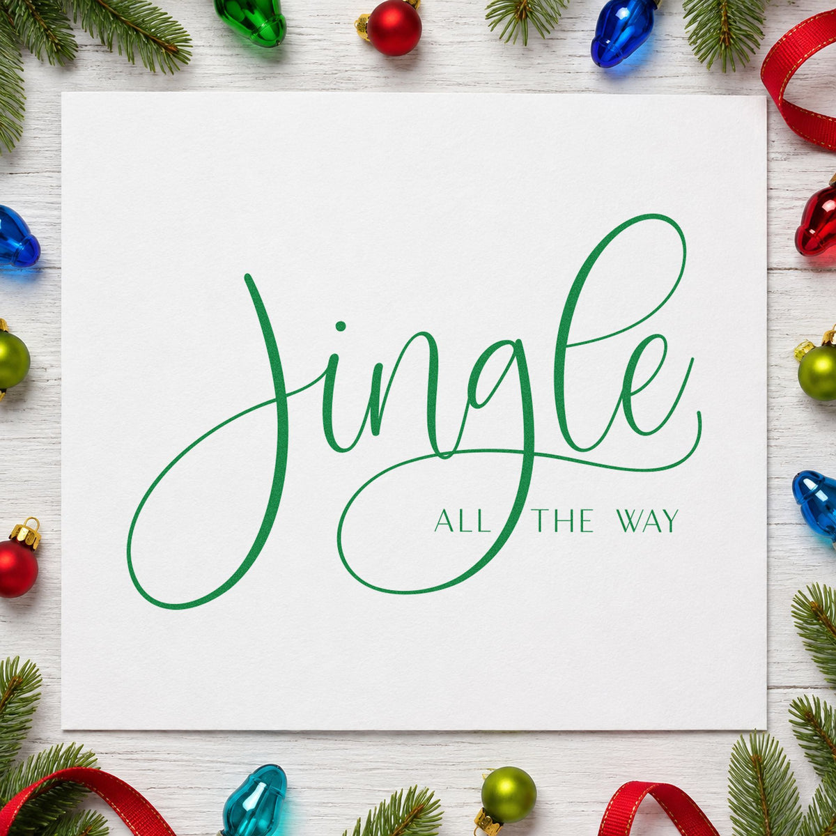 Jingle All The Way Calligraphy craft stamp in green ink on cardstock, an easy option for loop study album.