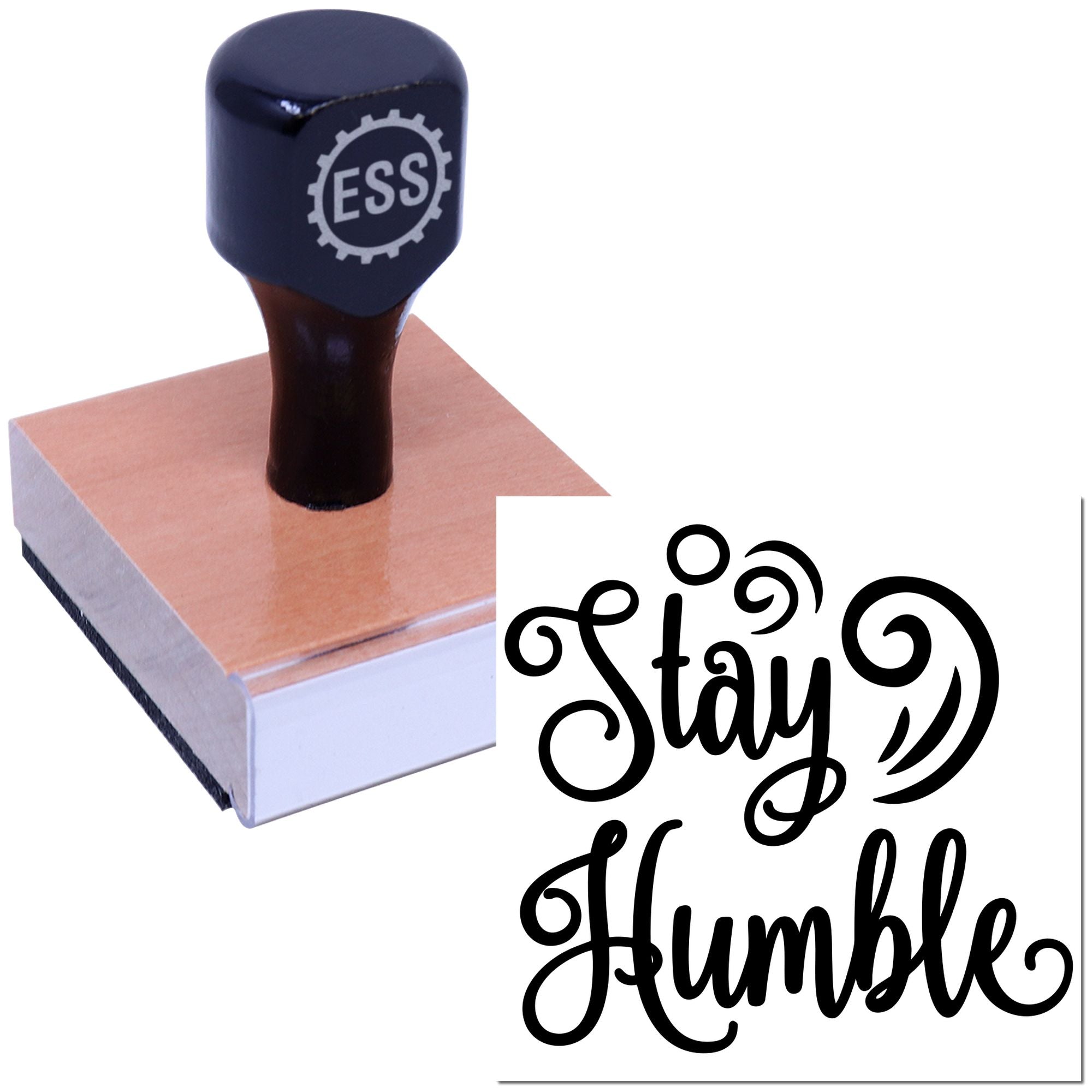 Dark navy ESS rubber stamp on a pink seal block beside black Stay Humble script design.