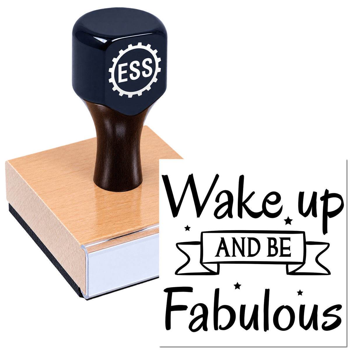 Dark navy ESS stamp on pink wood block beside black "Wake up and be Fabulous" seal design on white background.
