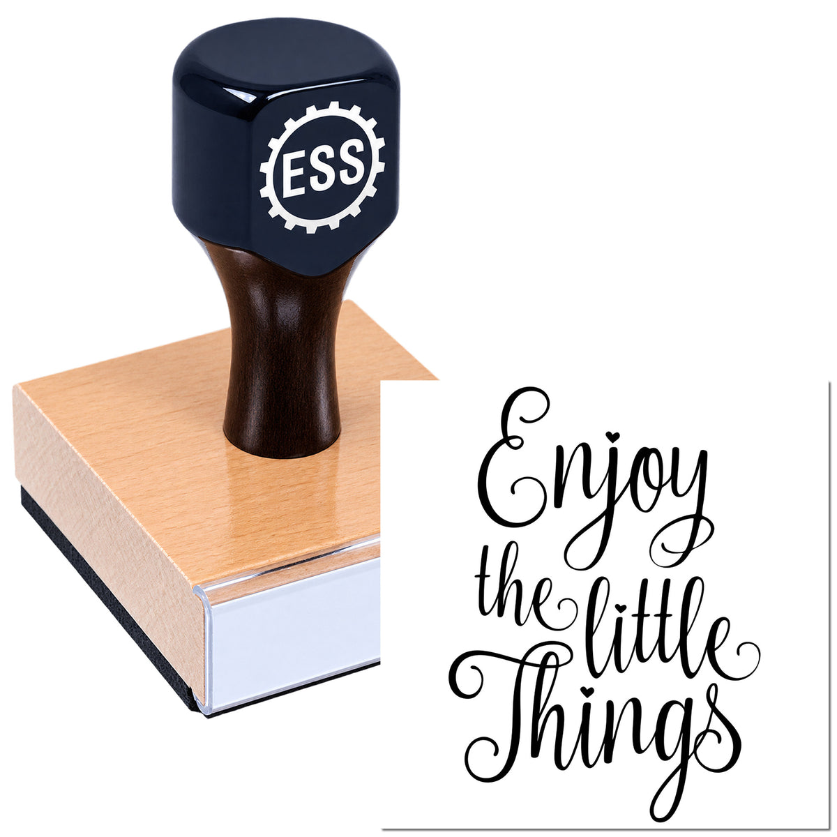 Black ESS stamp and seal on rose-gold block, with "Enjoy the little things" in black script on white.