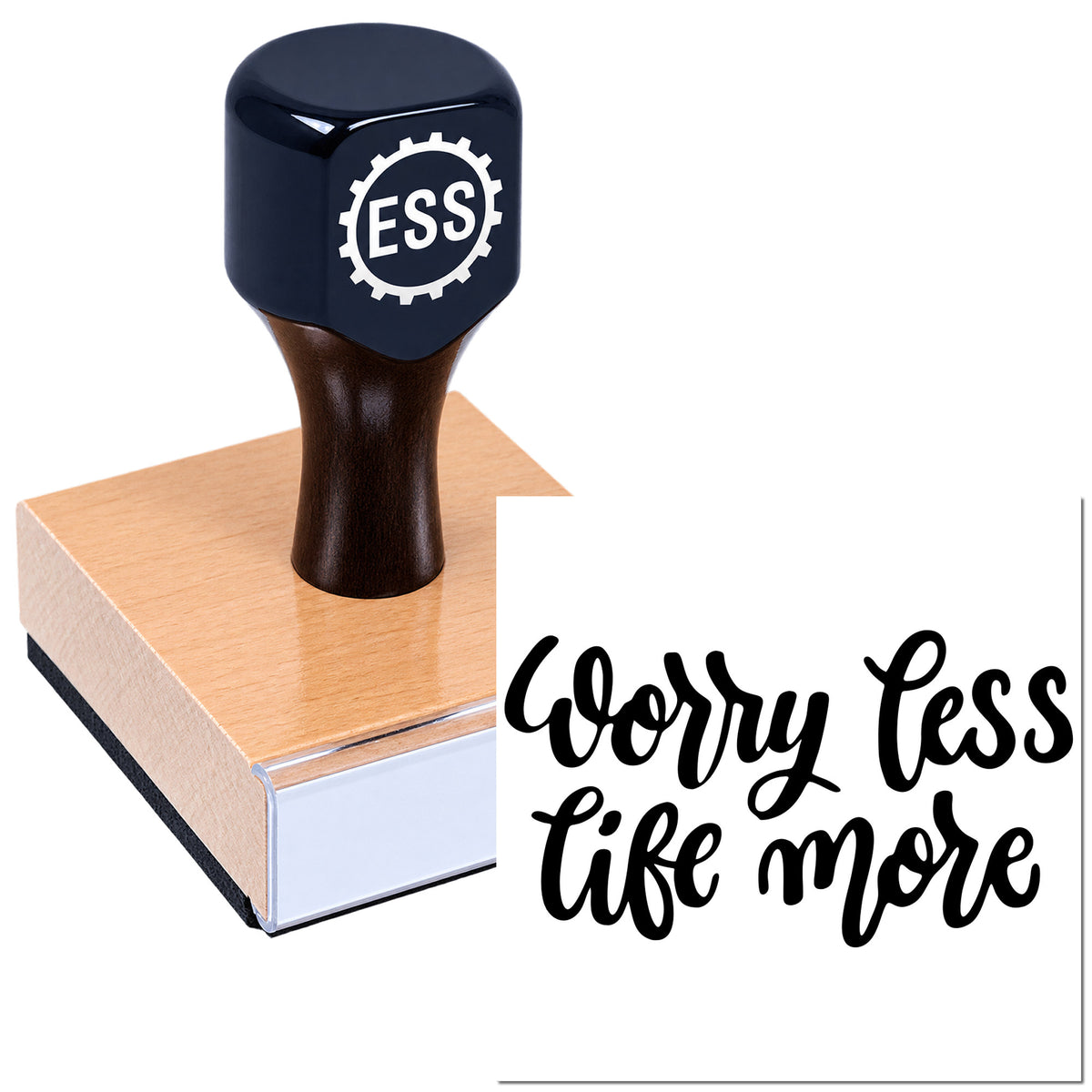 Black ESS rubber stamp on copper-colored seal block, with "Worry Less Life more" script on white background