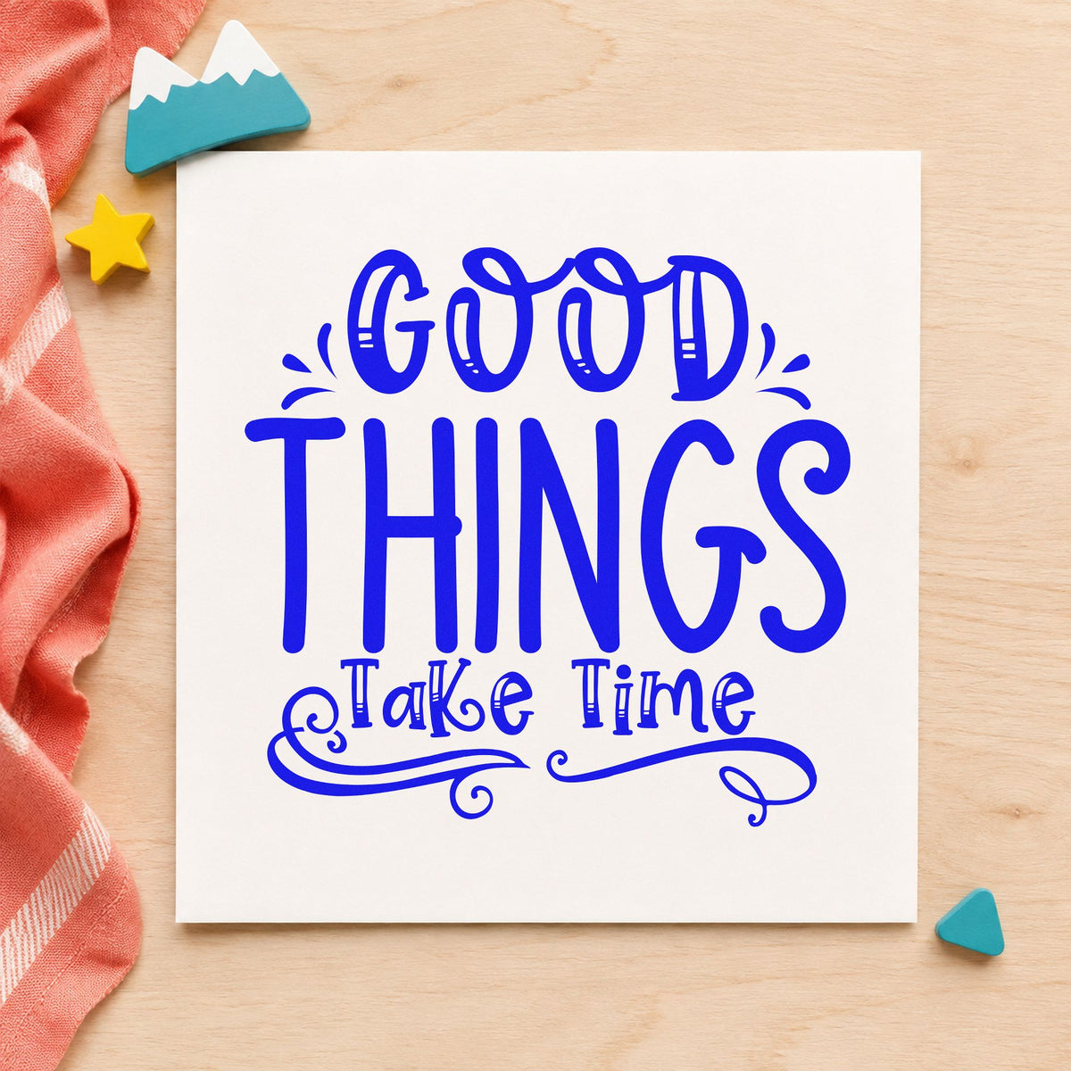 Good Things Take Time Flourishes craft stamp in blue ink on cardstock, an easy option for bench cloth printing.