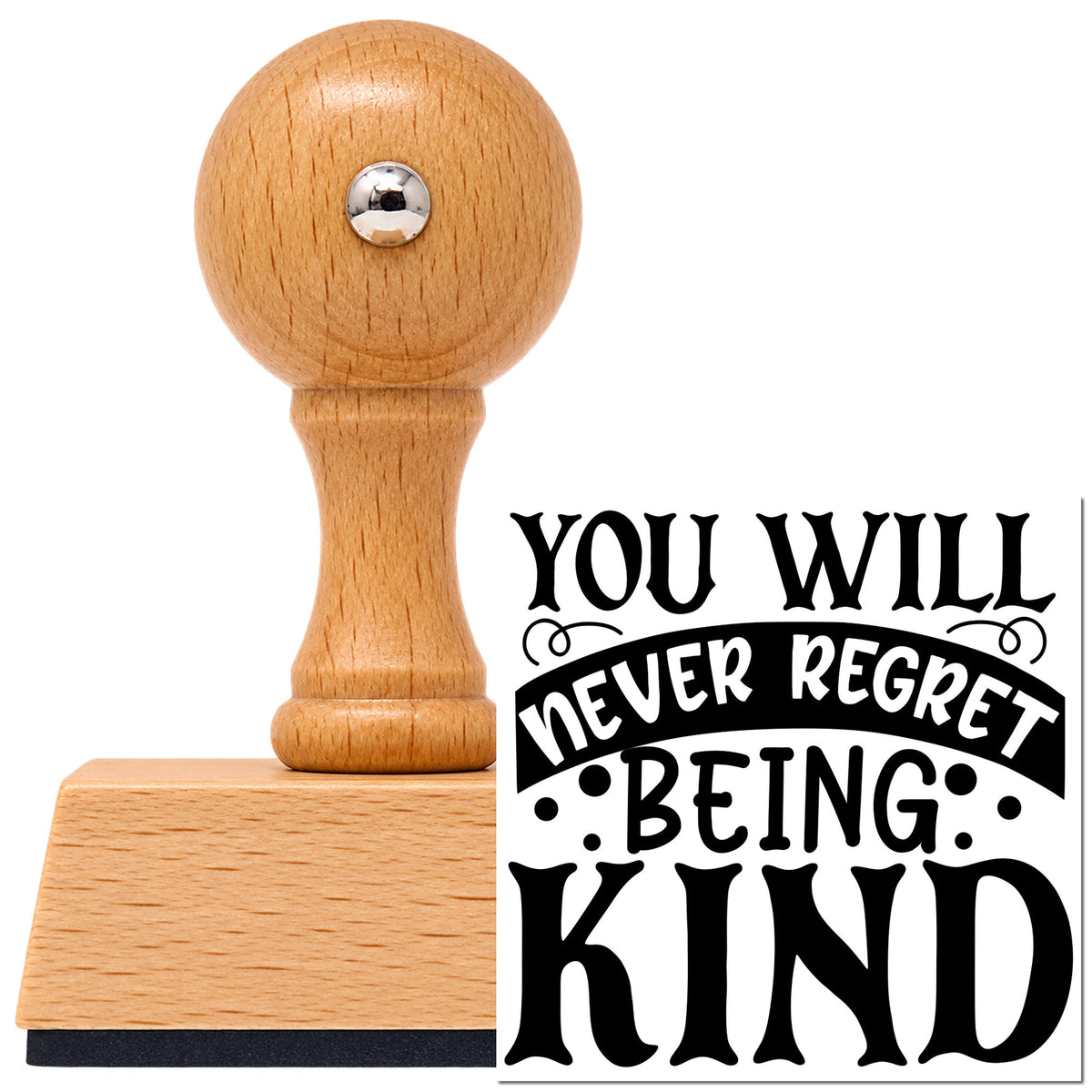 Vintage Pro beech wood stamp with a round knob handle, shown with its black Never Regret Being Kind imprint on white.