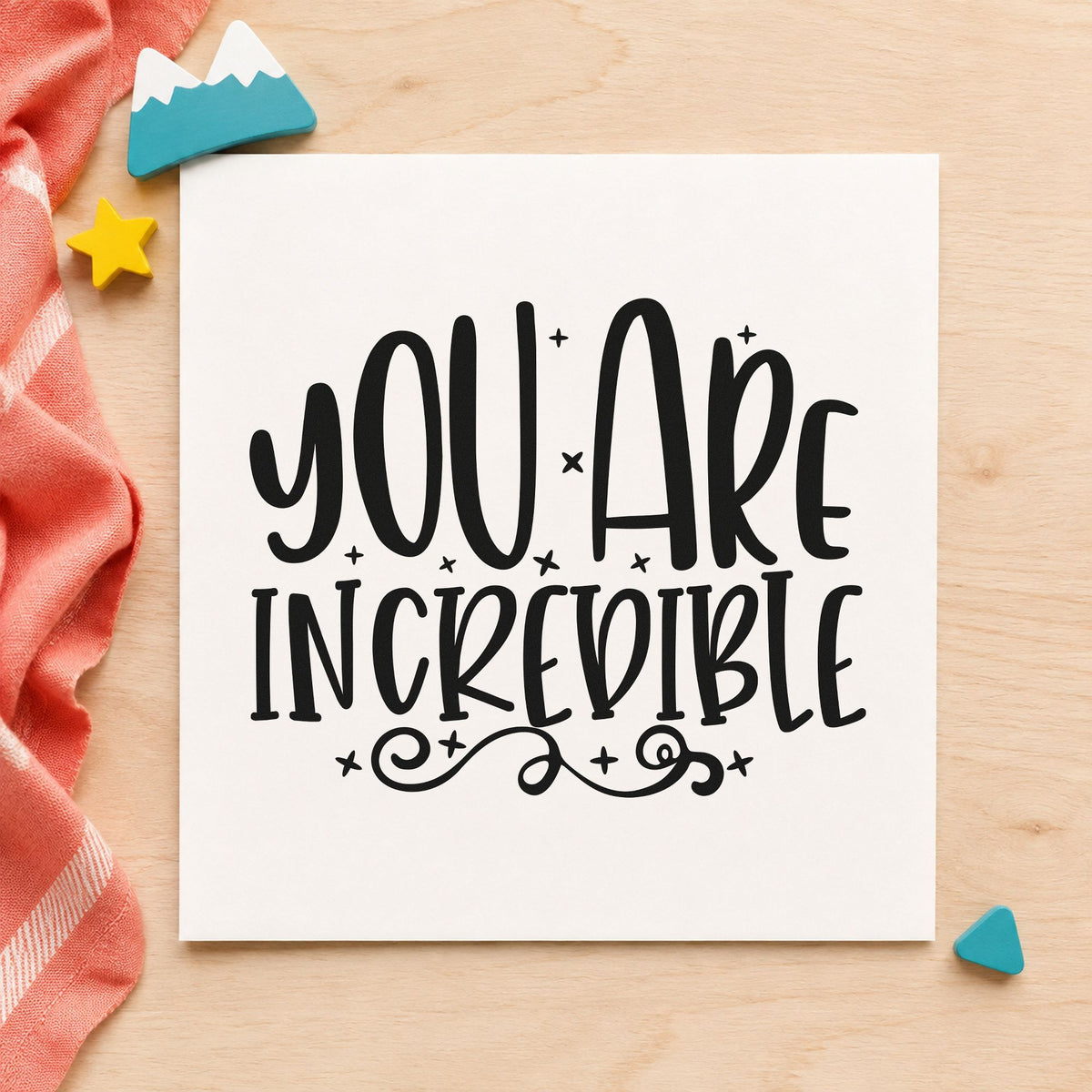 You Are Incredible Flourishes craft stamp imprint in black ink on a handmade project, one idea being supply basket tags.