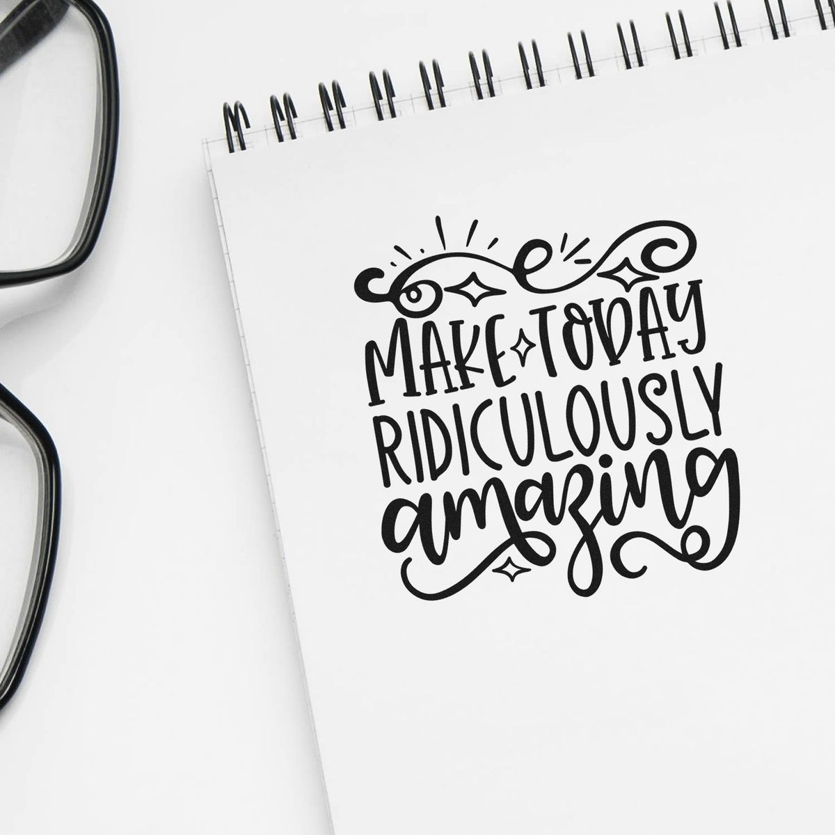 Slim Pre-Inked Make Today Ridiculously Amazing With Sparkles Stamp imprint stamped in black ink. The phrase "Make today ridiculously amazing" includes an ornate top flourish and small diamond sparkles.