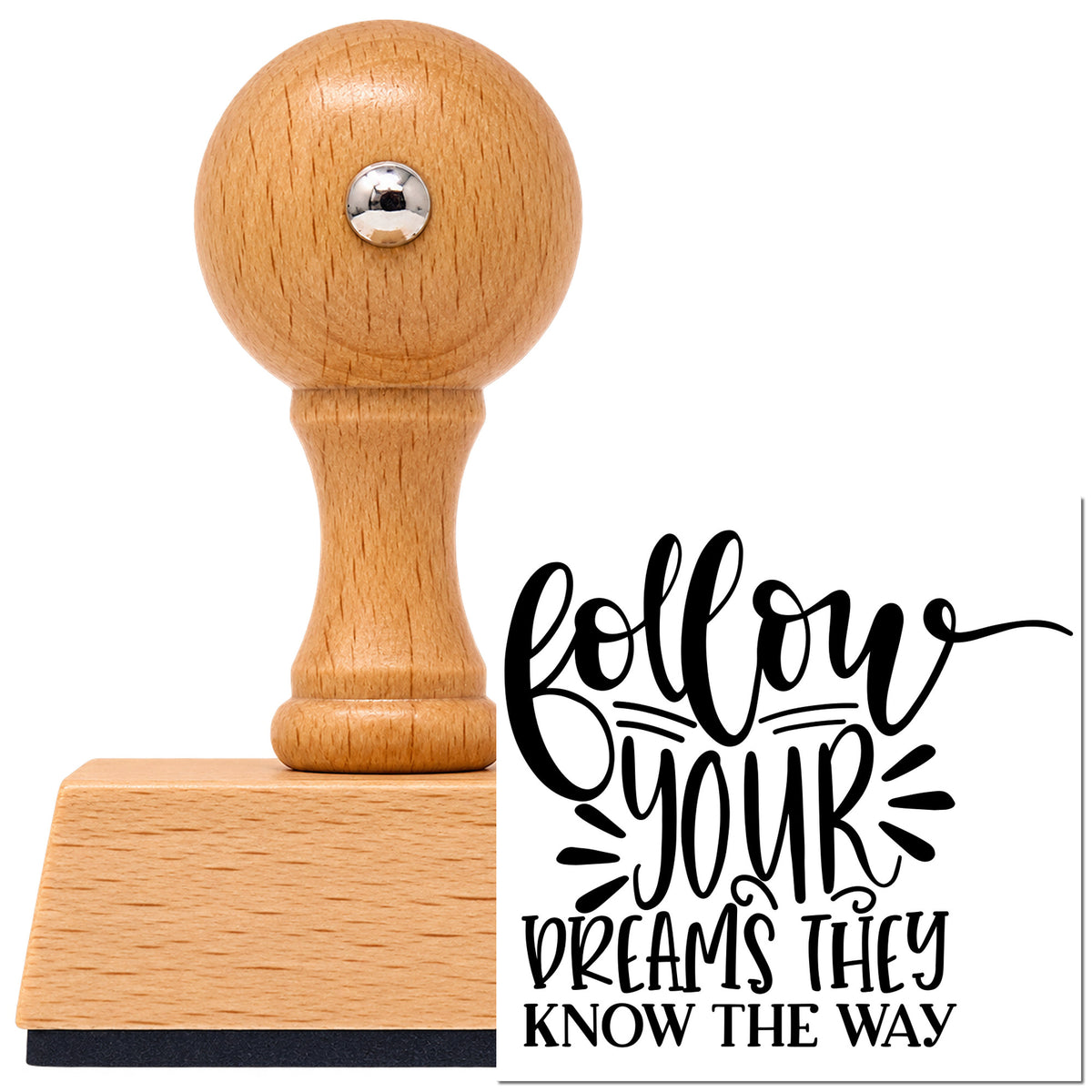 Vintage Pro beech wood stamp with a round knob handle, shown with its black Follow Dreams Know The Way imprint on white.