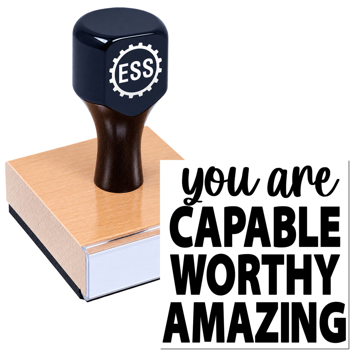 Navy custom rubber stamp seal with ESS logo on a pink block, beside black text: you are capable, worthy, amazing.