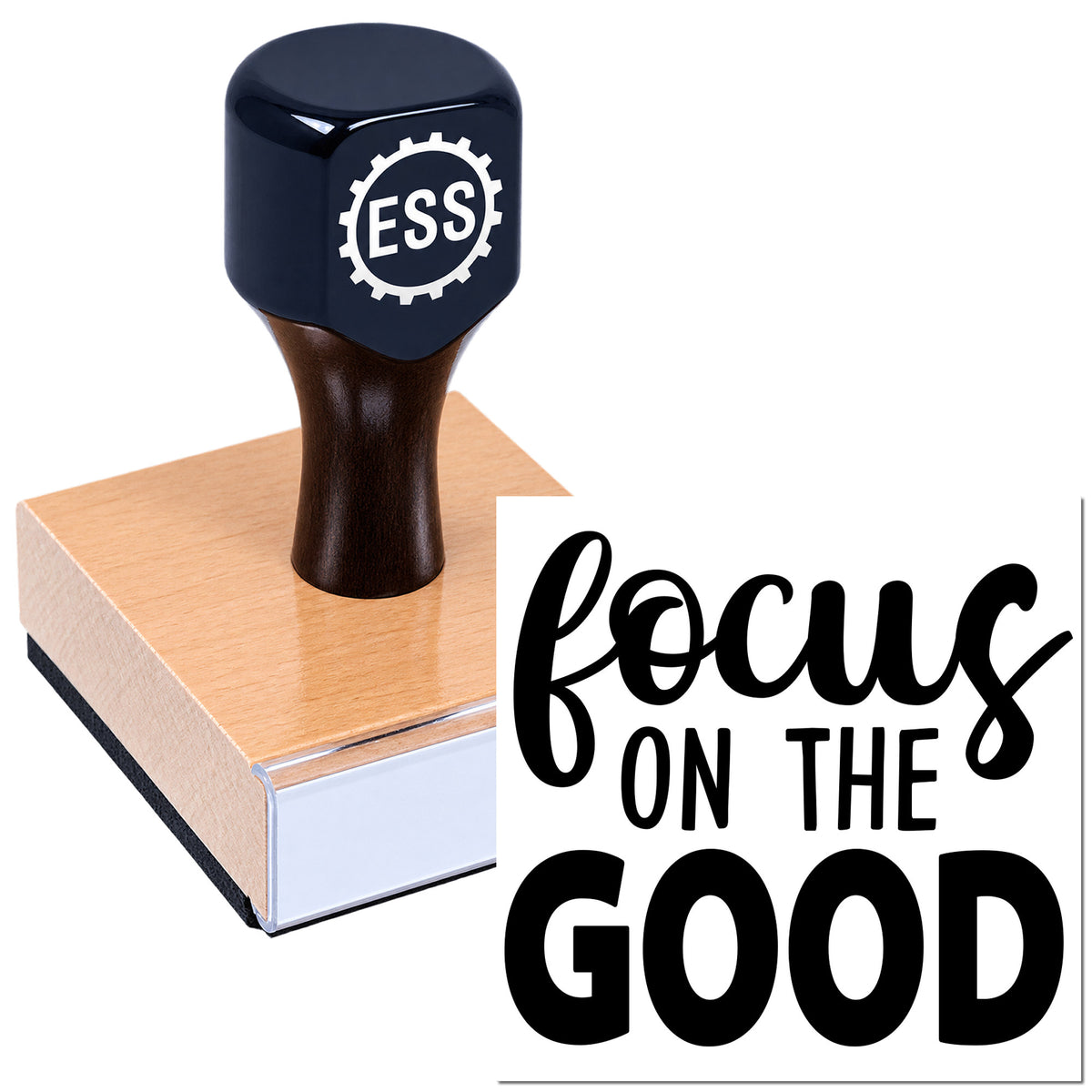 Dark blue ESS rubber stamp on a square wood block with black "focus on the good" seal design.
