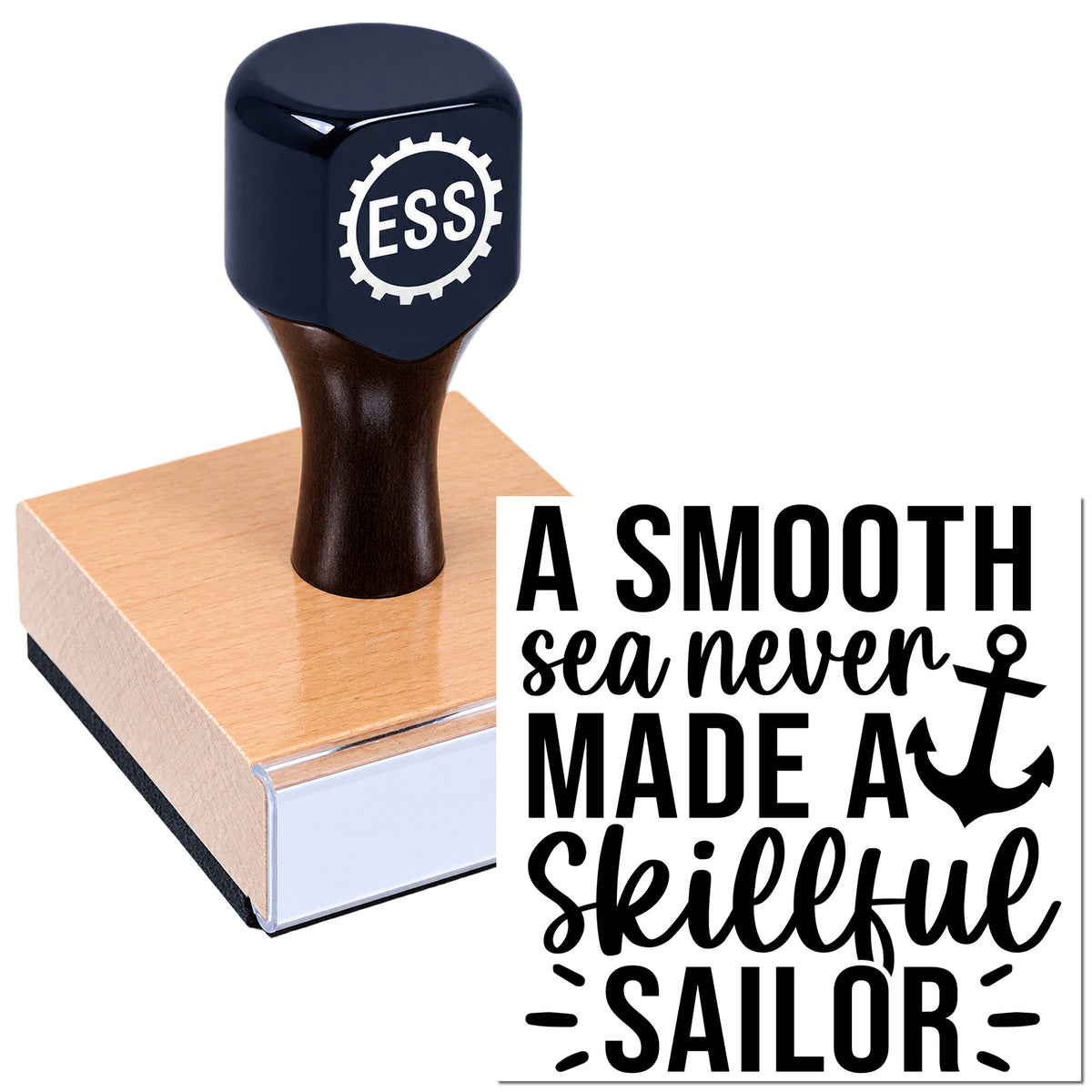 Dark navy custom rubber stamp with ESS logo, pressed on a wood block beside a black anchor quote design.