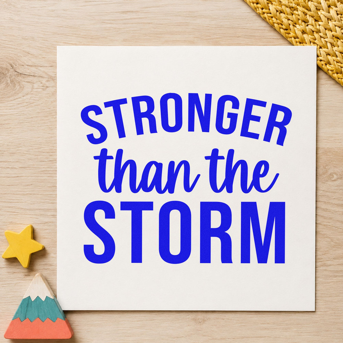 Stronger Than The Storm craft stamp imprinted in blue ink on paper, a design suited to framed fire hall.