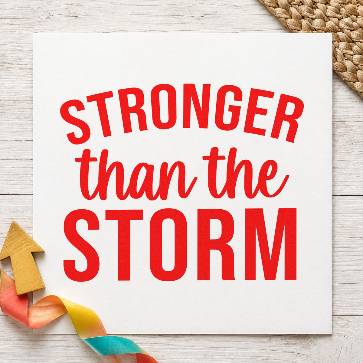 Stronger Than The Storm rubber stamp shown in red ink, stamped for projects such as bin tool labels.