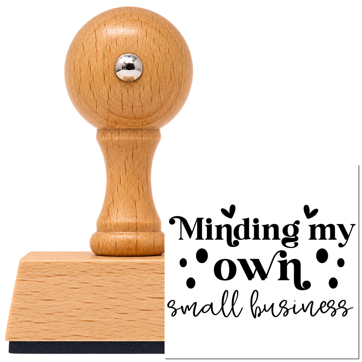 Vintage Pro beech wood stamp with a round knob handle, shown with its black Minding My Own Small Business imprint on white.