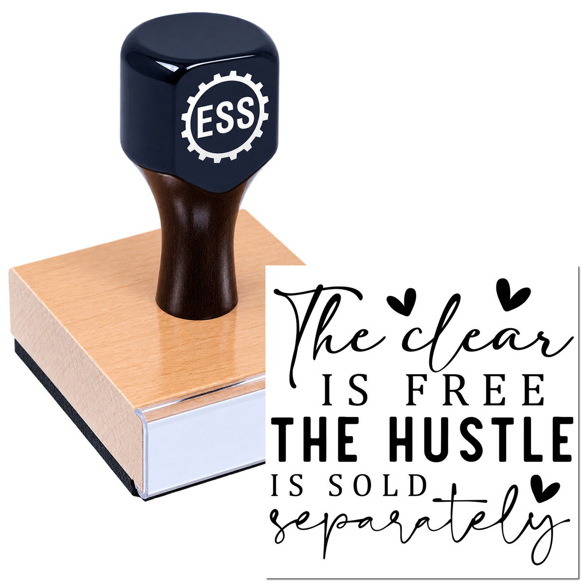 Black ESSI rubber stamp on wooden seal block with "The clear is free, the hustle is sold separately" script design.