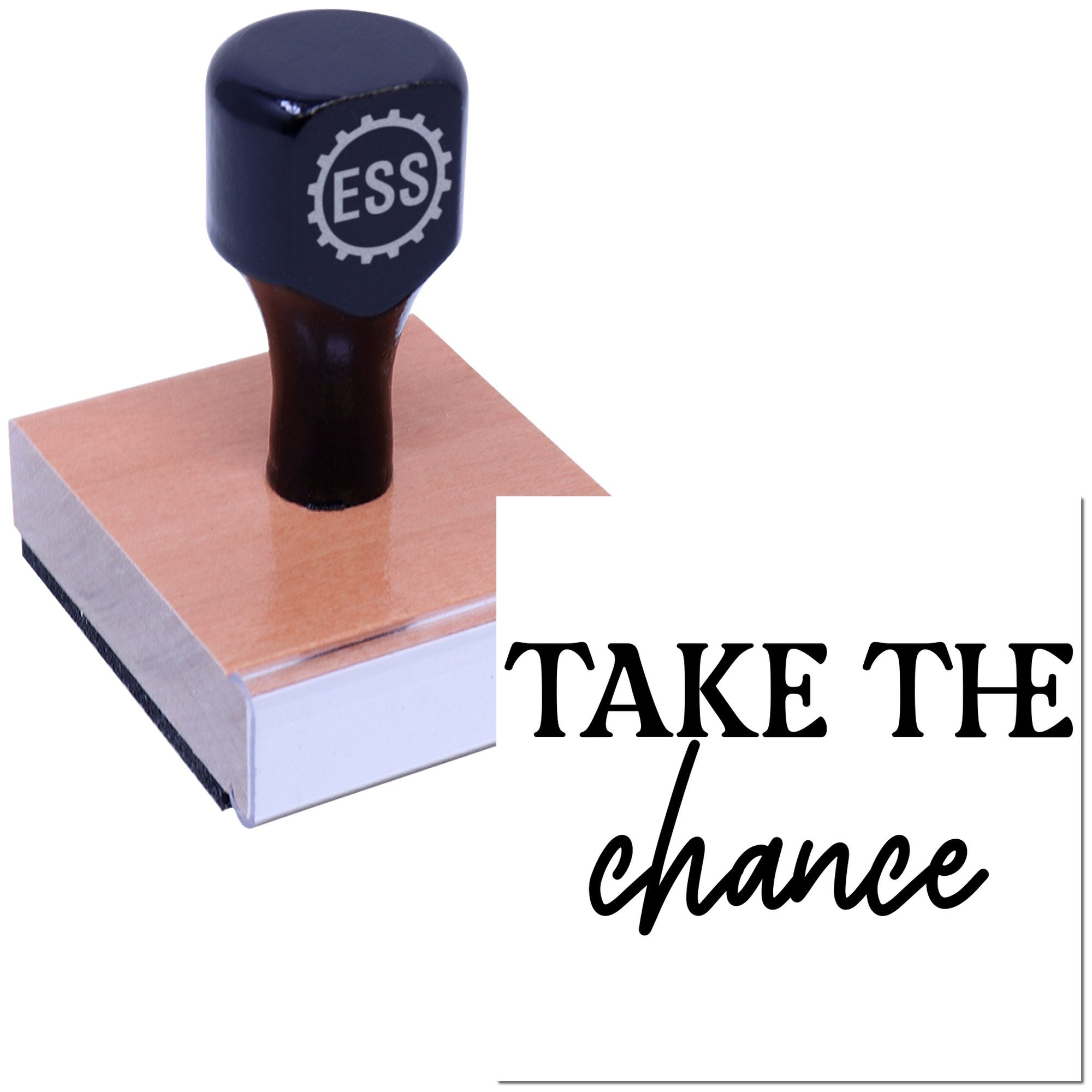 Dark blue ESS rubber stamp on a copper seal block with white logo and Take the chance text.