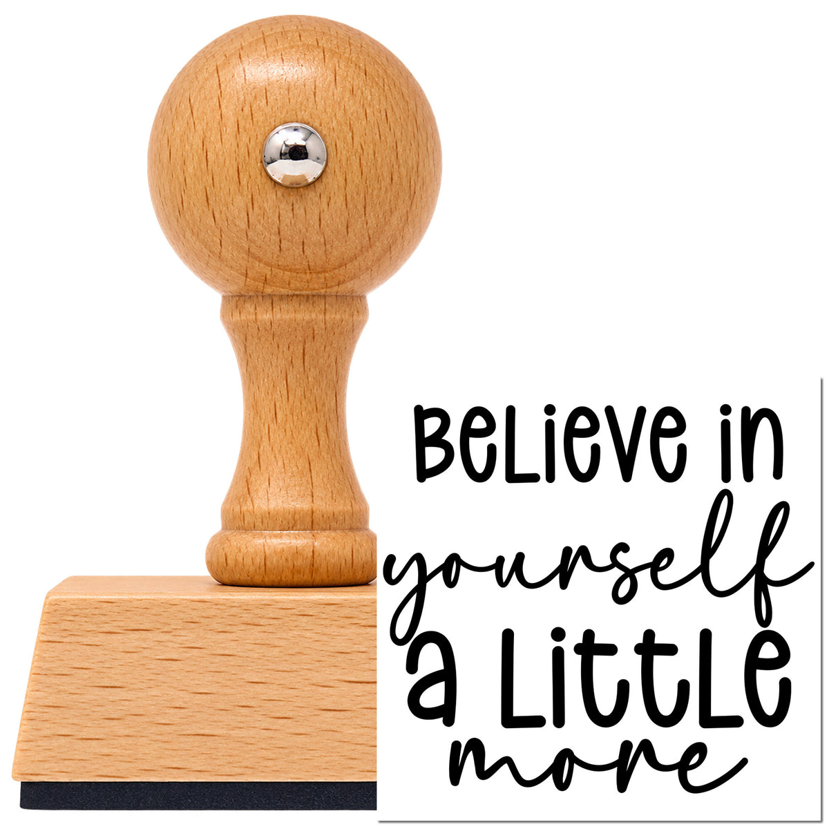 Vintage Pro beech wood stamp with a round knob handle, shown with its black Believe Yourself A Little More imprint on white.