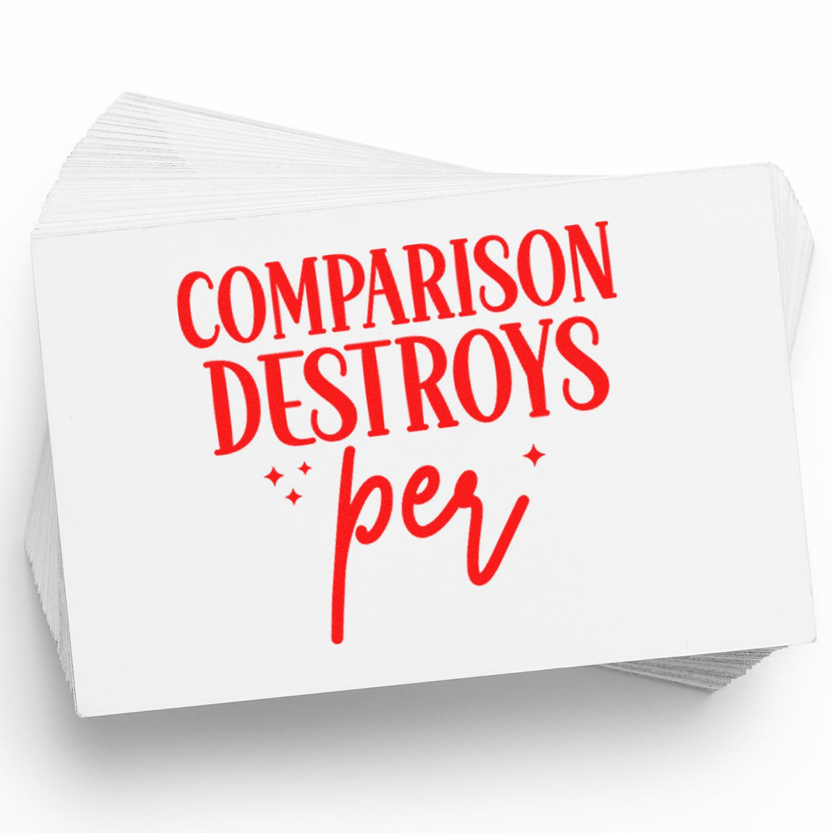 Stack of white stamp and seal cards with bold red COMPARISON DESTROYS text and sparkle accents.