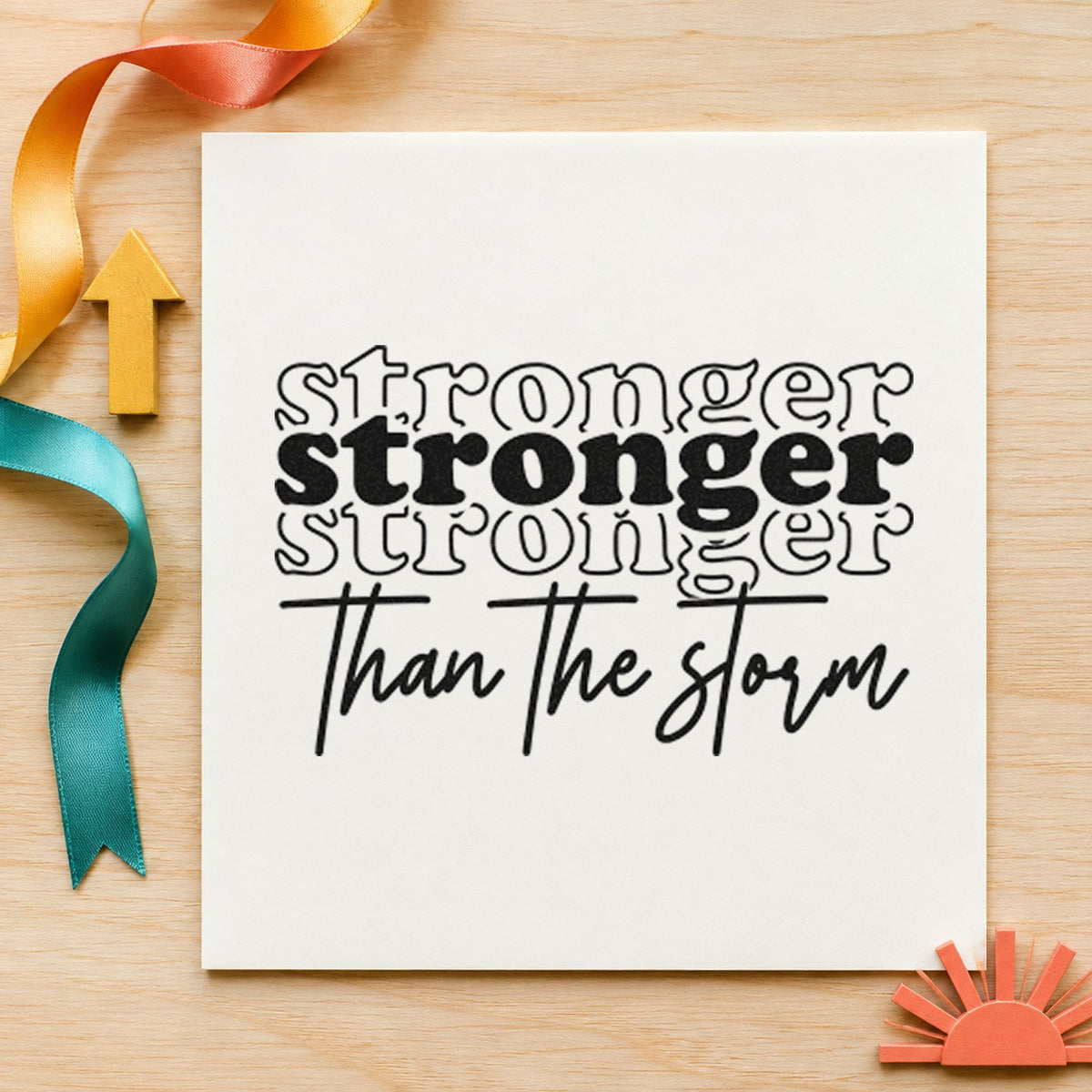 Stronger Than The Storm Repeated craft stamp in black ink on cardstock, an easy option for season album page.