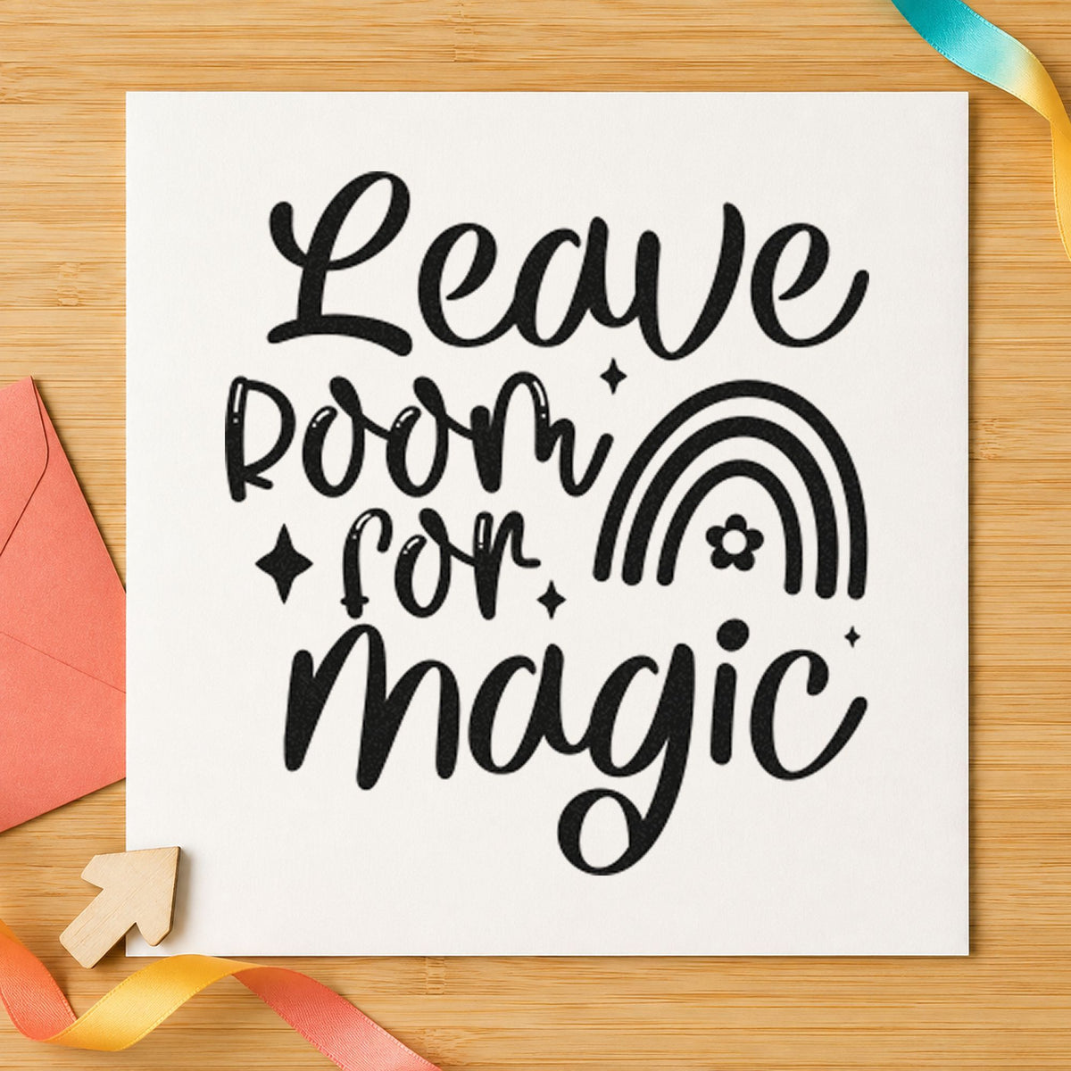Leave Room For Magic Rainbow craft stamp imprint in black ink on a handmade project, one idea being kit box gift tags.