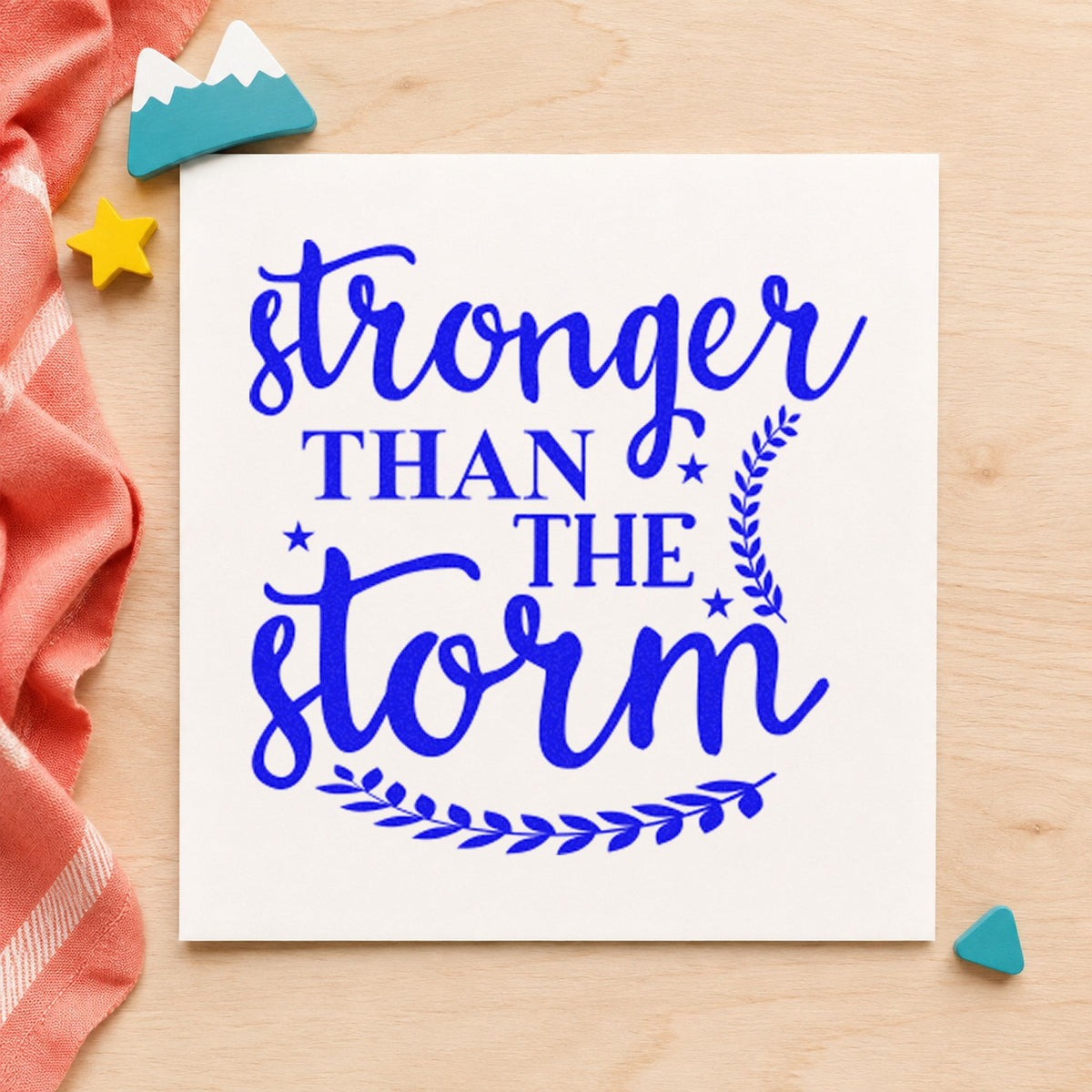 Stronger Than The Storm Leaves craft stamp in blue ink on cardstock, an easy option for bench cover printing.