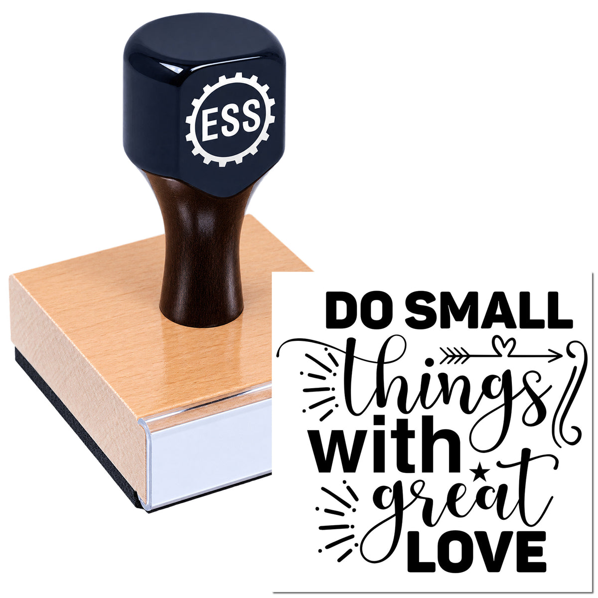 Black ESS rubber stamp on pink wood-mounted seal block with "Do small things with great love" design