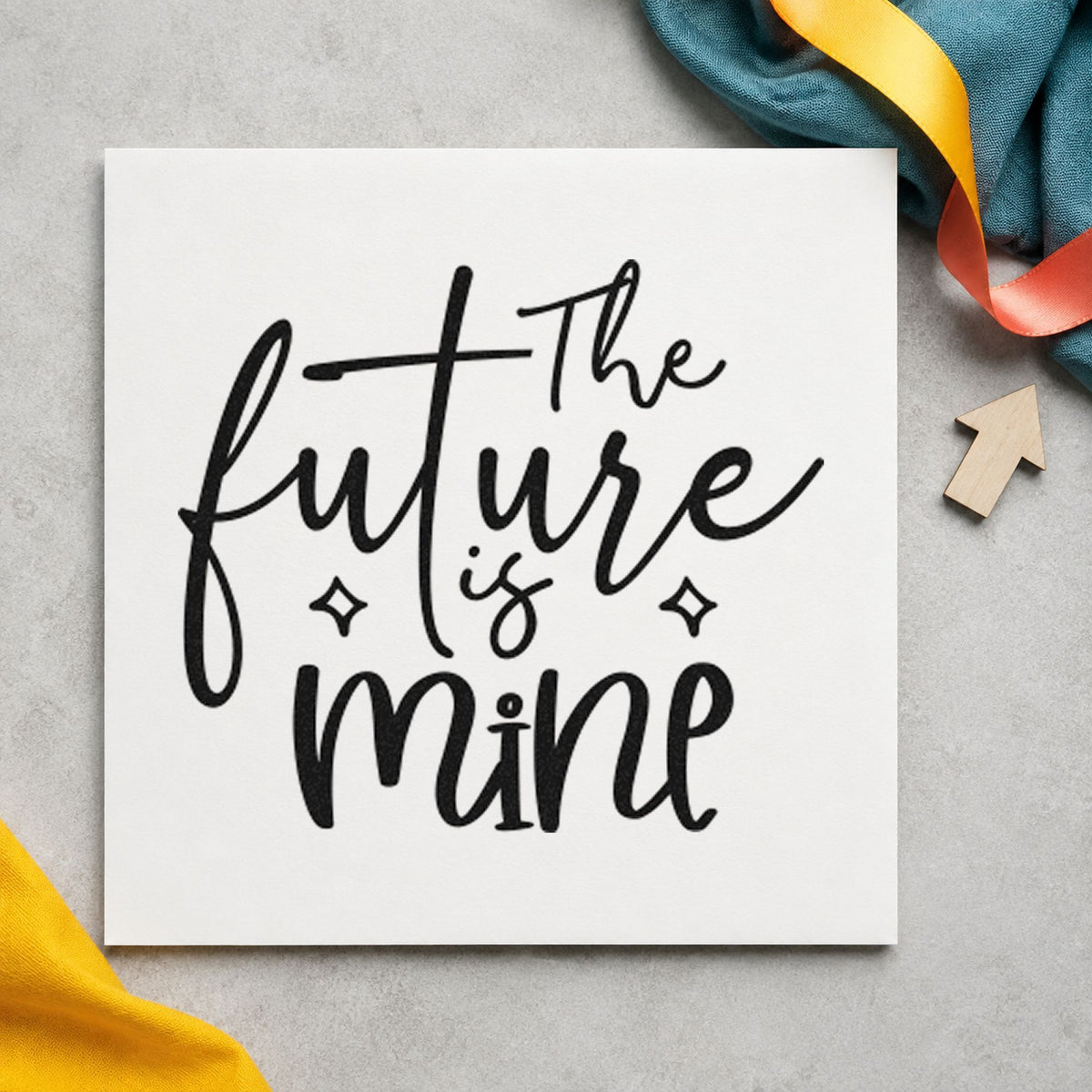 The Future Is Mine craft stamp imprint in black ink on a handmade project, one idea being housewarming tags.