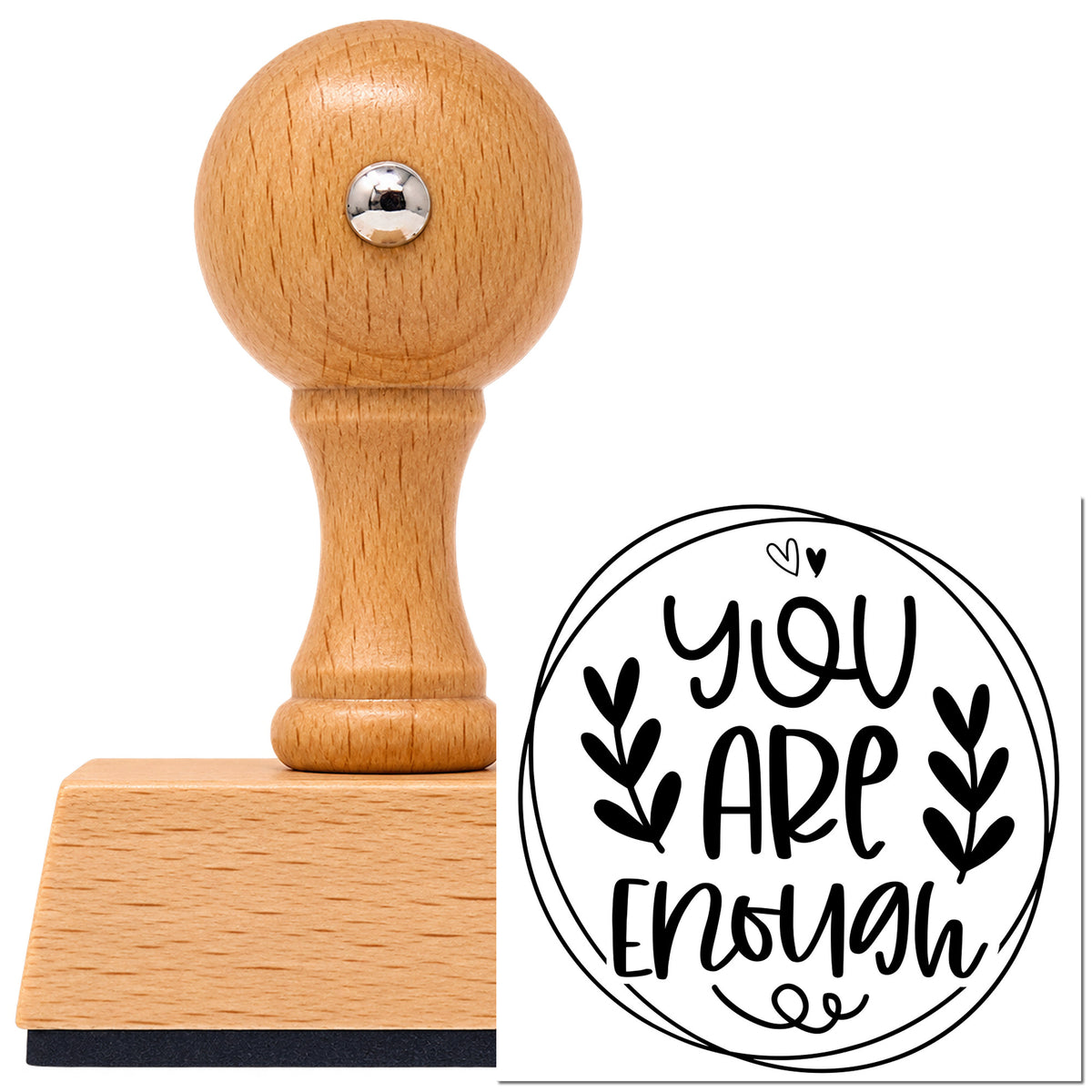 Vintage Pro beech wood stamp with a round knob handle, shown with its black You Are Enough Circle Leaves imprint on white.