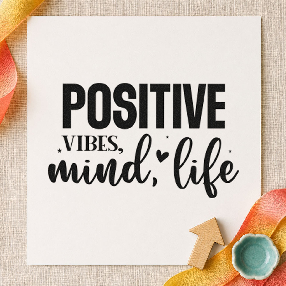 Positive Vibes Mind Life craft stamp imprint in black ink on a handmade project, one idea being bottle gift tags.