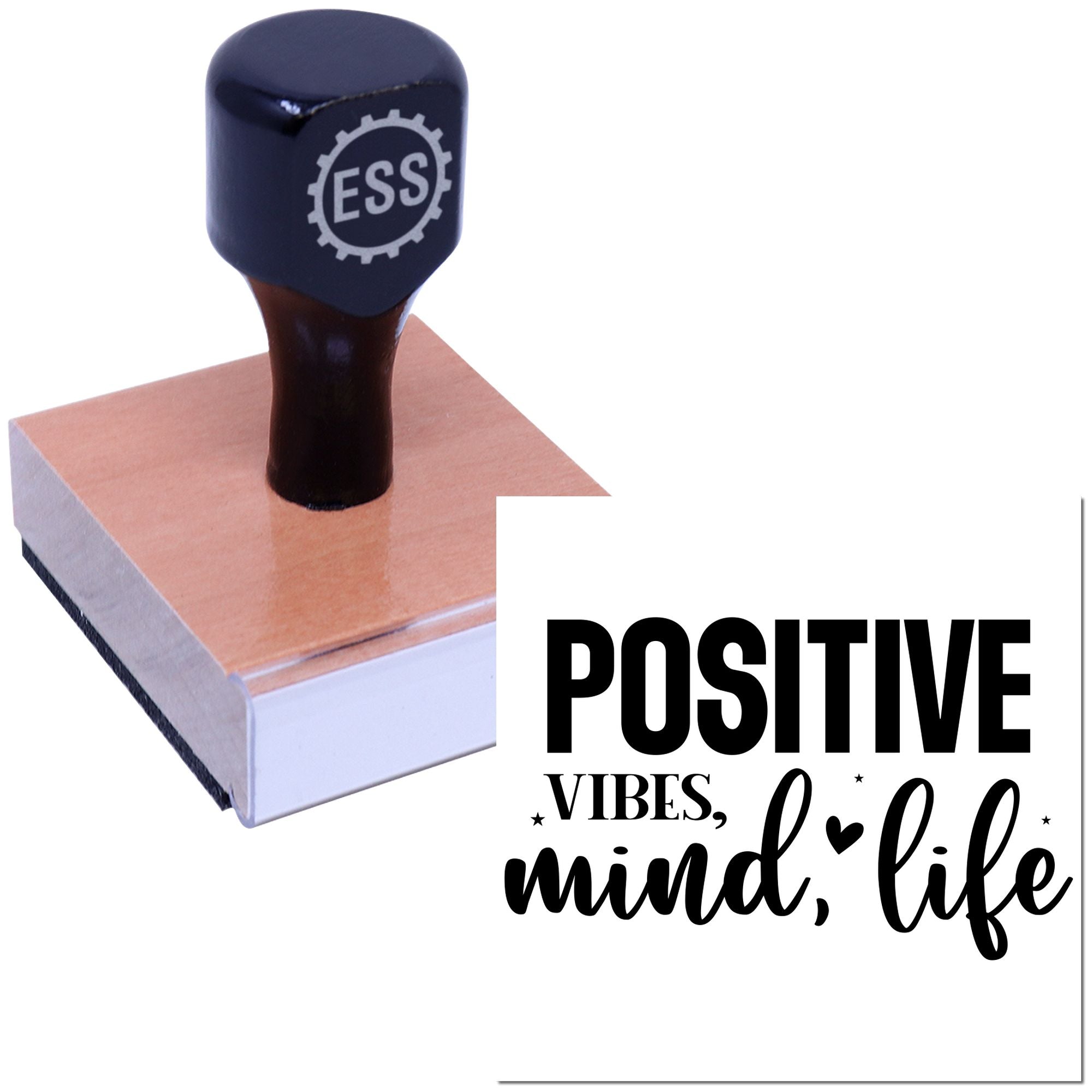 Black ESS rubber stamp on copper seal block with POSITIVE VIBES, mind, life text on a white background.