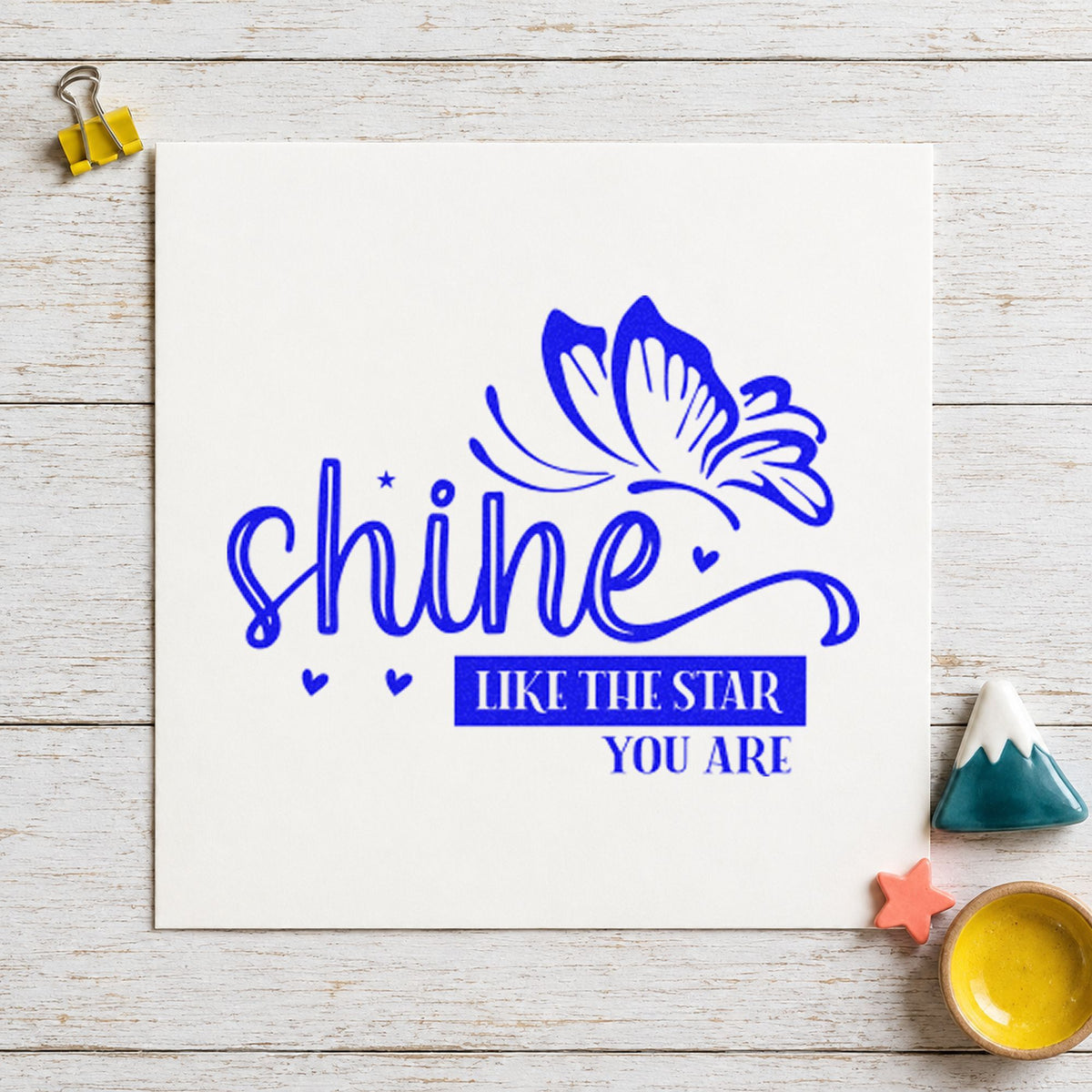 Shine Like Star Butterfly craft stamp in blue ink on cardstock, an easy option for choir stole printing.