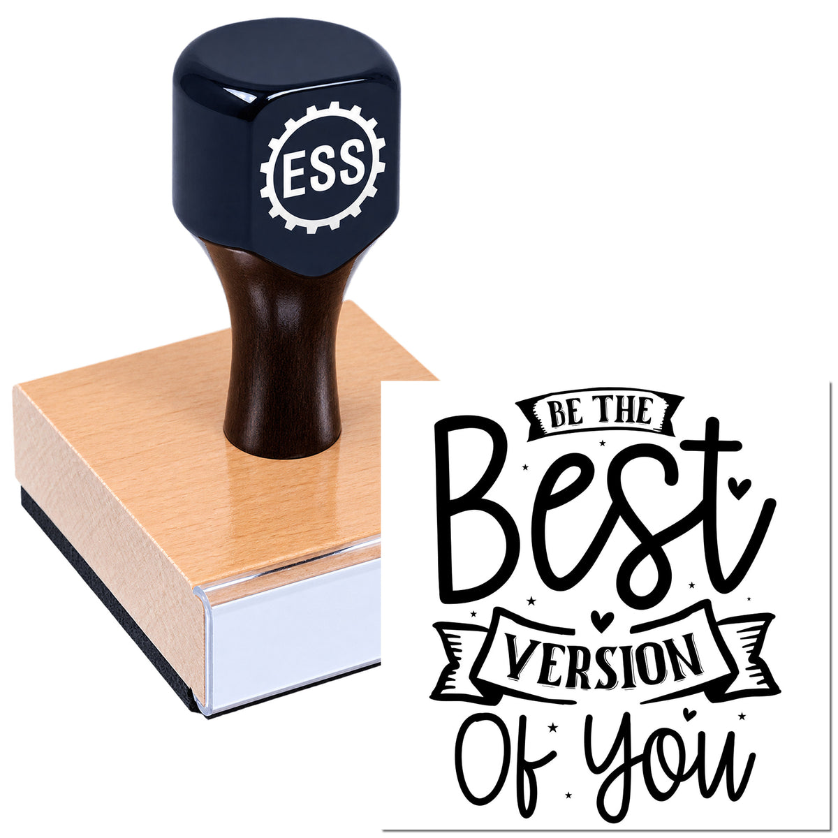 Black rubber stamp with pink wooden block, imprinting "Be the Best Version of You" in bold script on white background.