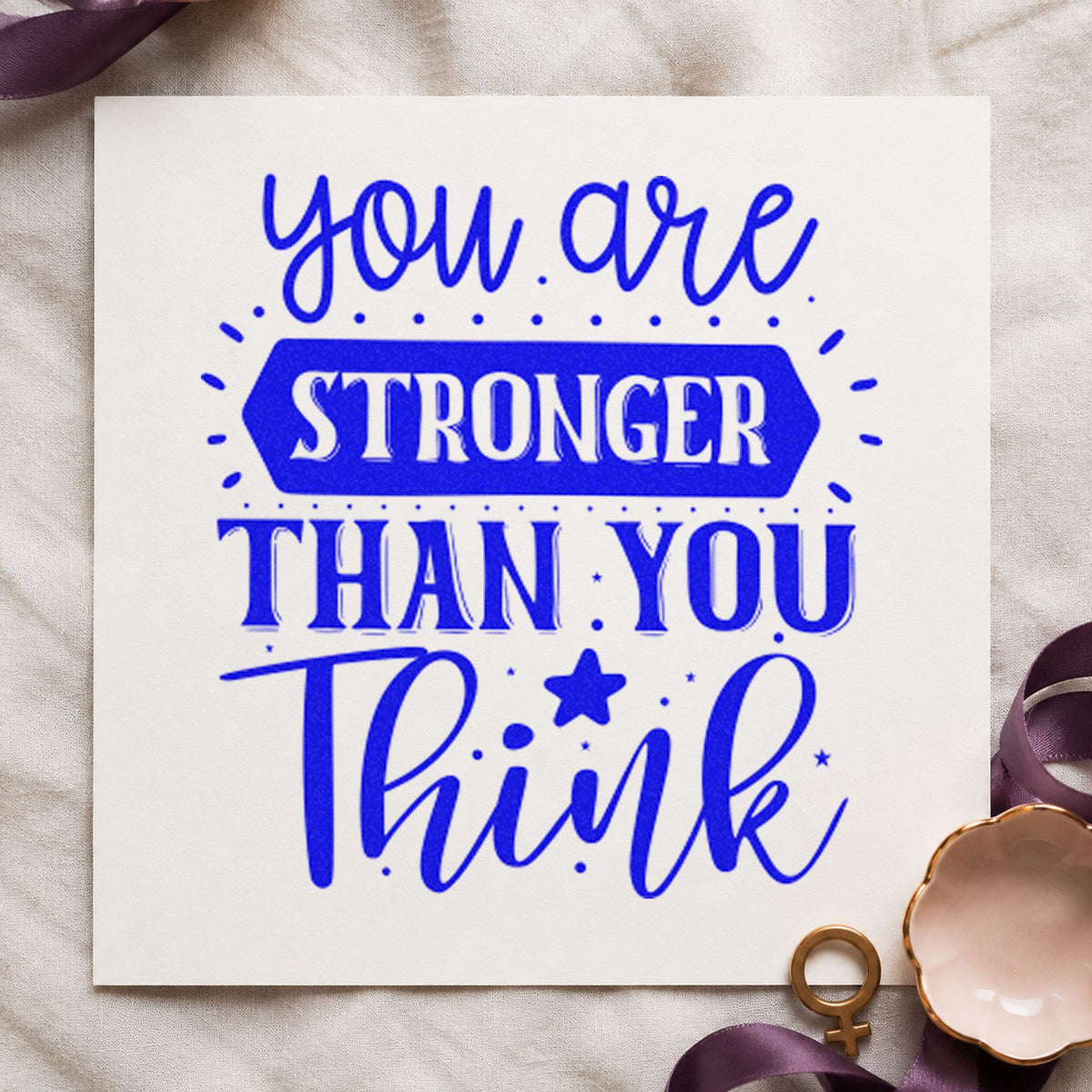 You Are Stronger Than Think craft stamp in blue ink on cardstock, an easy option for dry robe printing.