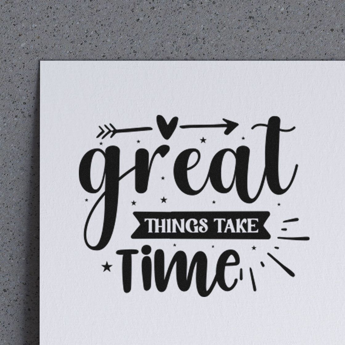 Black decorative stamp/seal reading great things take time with hearts, arrows and stars on white paper.