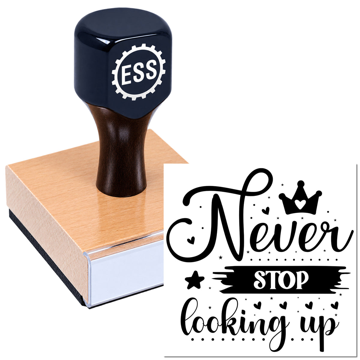 Black ESS self-inking stamp on a pink base beside a black "Never stop looking up" seal design.