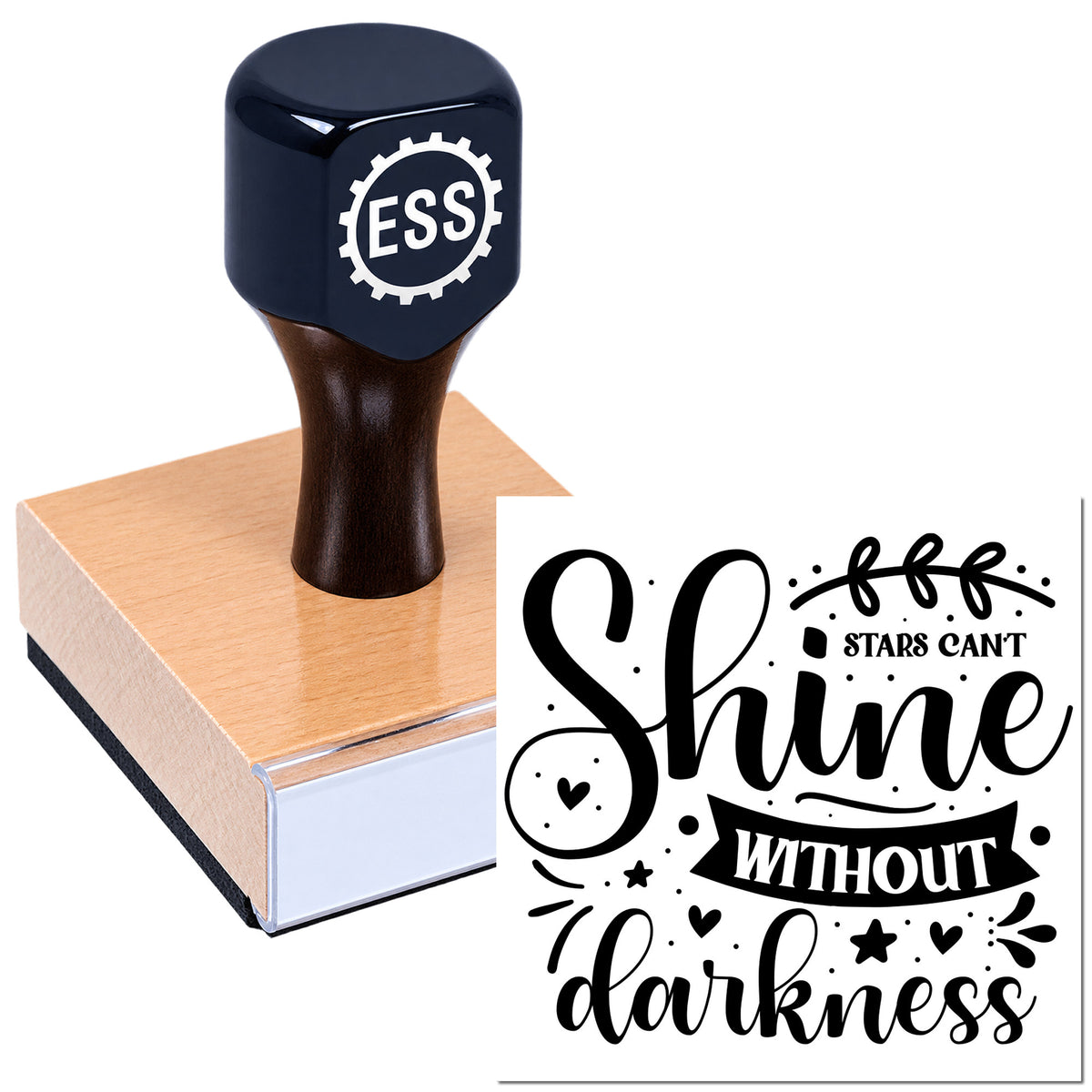 Black self-inking stamp on a pink seal pad with "Stars can't shine without darkness" design, white background.