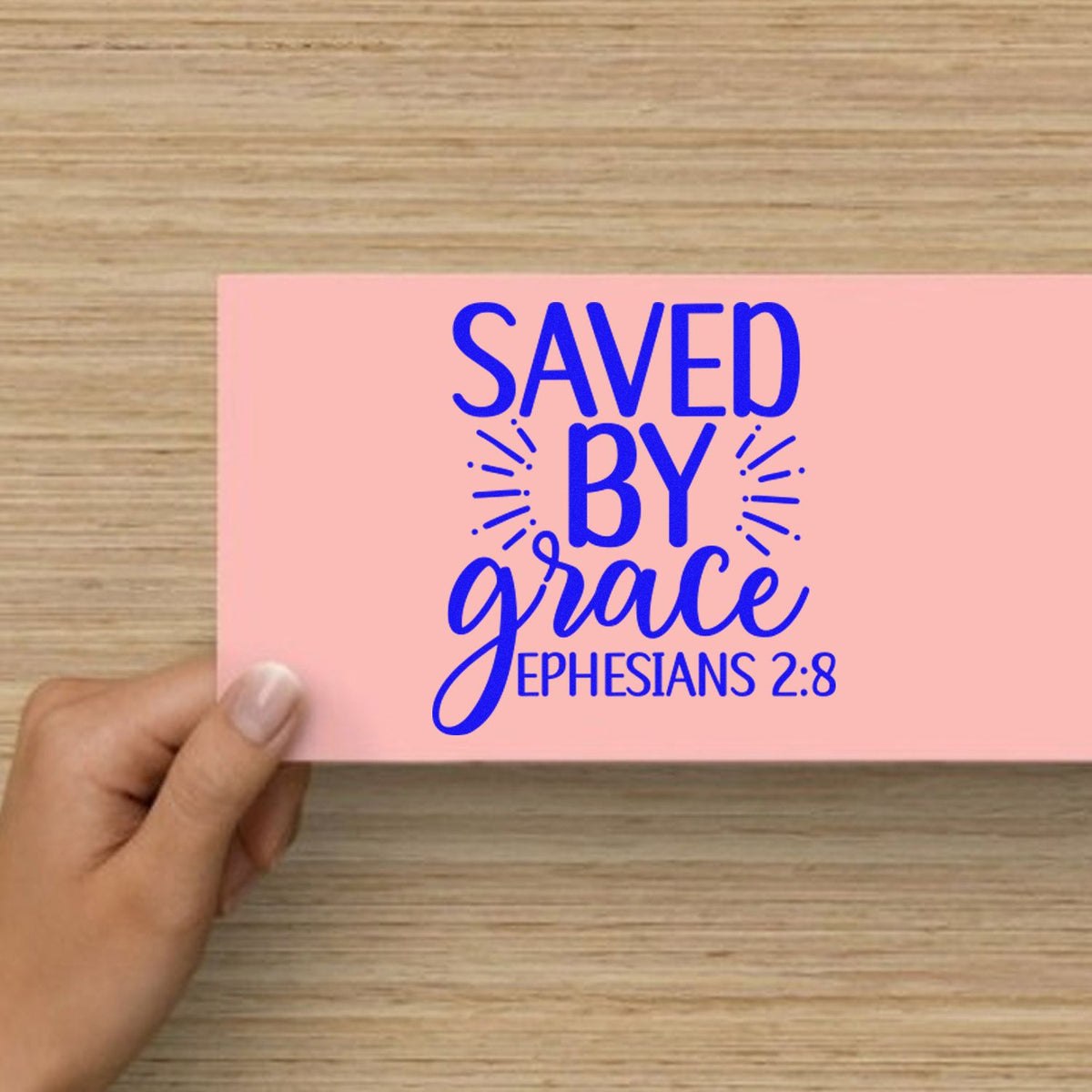 Saved By Grace Ephesians rubber stamp shown in blue ink, stamped for projects such as welcome album page.