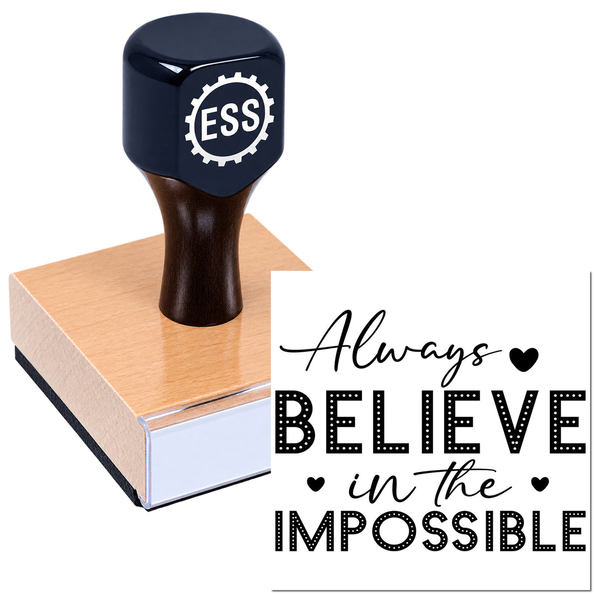 Dark navy rubber stamp seal with ESS logo on a wooden base beside an "Always Believe in the Impossible" design.