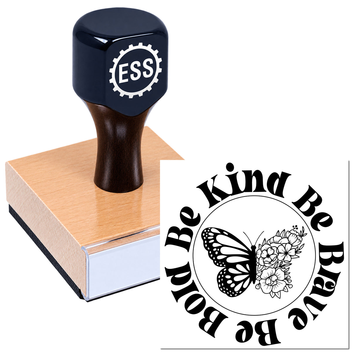 Navy self-inking stamp on a pink pad with a black butterfly-and-flower seal and Be Kind Be You text.