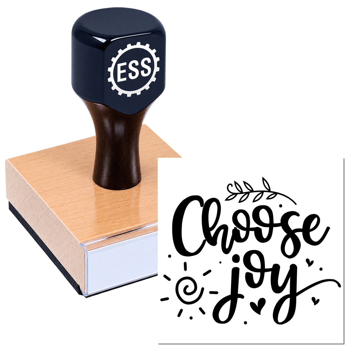 Black ESS rubber stamp seal on a wooden block with a white "Choose Joy" design preview.