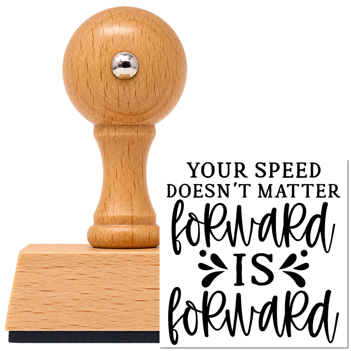 Vintage Pro beech wood stamp with a round knob handle, shown with its black Your Speed Doesn't Matter Forward Is Forward imprint on white.